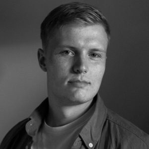 Mikkel_headshot_2025_bg Mikkel_headshot_2025_bg